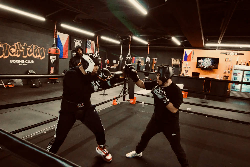 boxers training at the gym